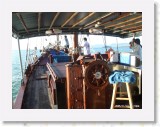 11130014 * Sunset cruising in Koh Samui on the traditional chinese Junk or Sampan.  The captain is a chair with a towel on it???? * 2240 x 1680 * (1.45MB)