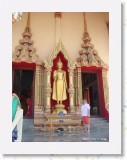 11160013 * Sam next to the standing buddha at the Wat Nuan Naram temple. * 1680 x 2240 * (774KB)