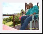 MelnGaryatHome * Mel and Gary on the balcony at Kakapu cottage. * 800 x 600 * (90KB)